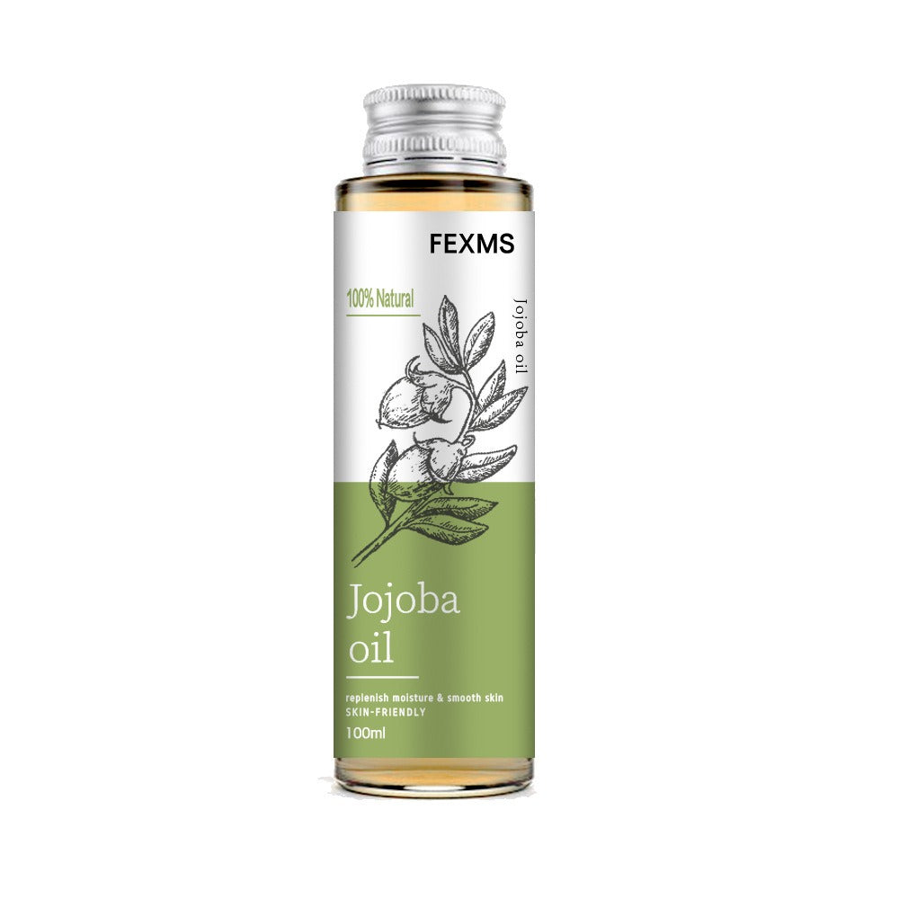 Clear bottle of Coconut Massage Body Oil displaying product label, ideal for skin nourishment and relaxation.